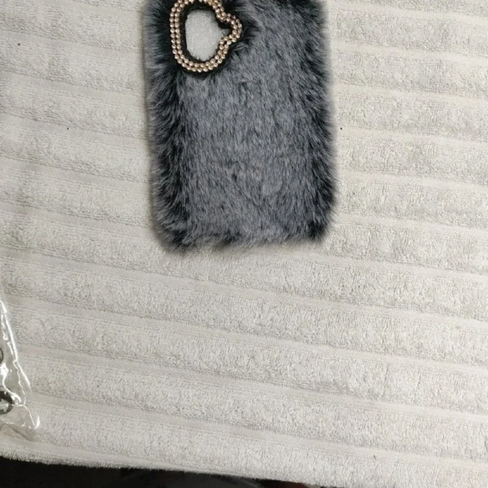 Elegant Gray Faux Fur Phone Case with Gold Heart Accent‎